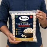 Tosha Premium Makhana pouch in hand